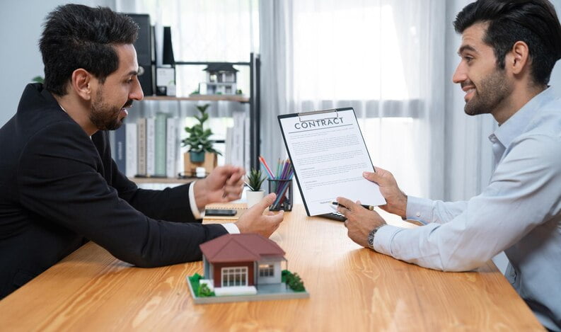 Advisors reviewing a financing solution with a client
